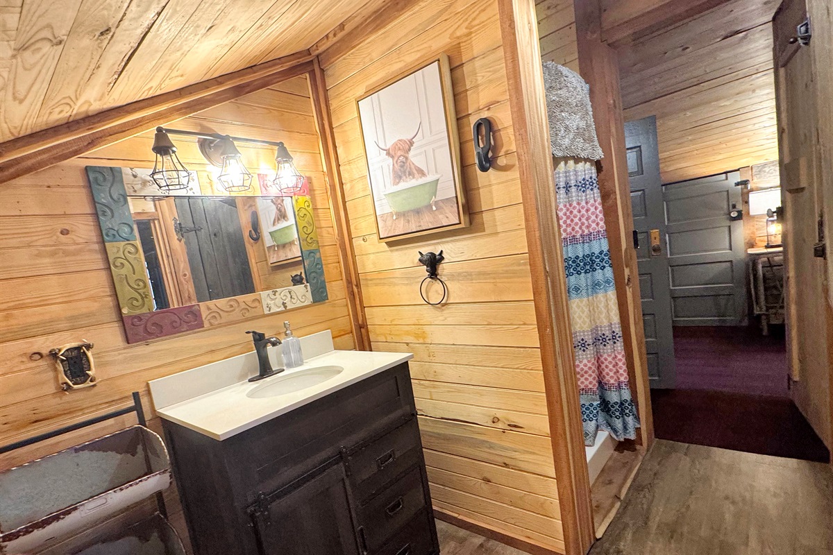 Upstairs bathroom with shower.