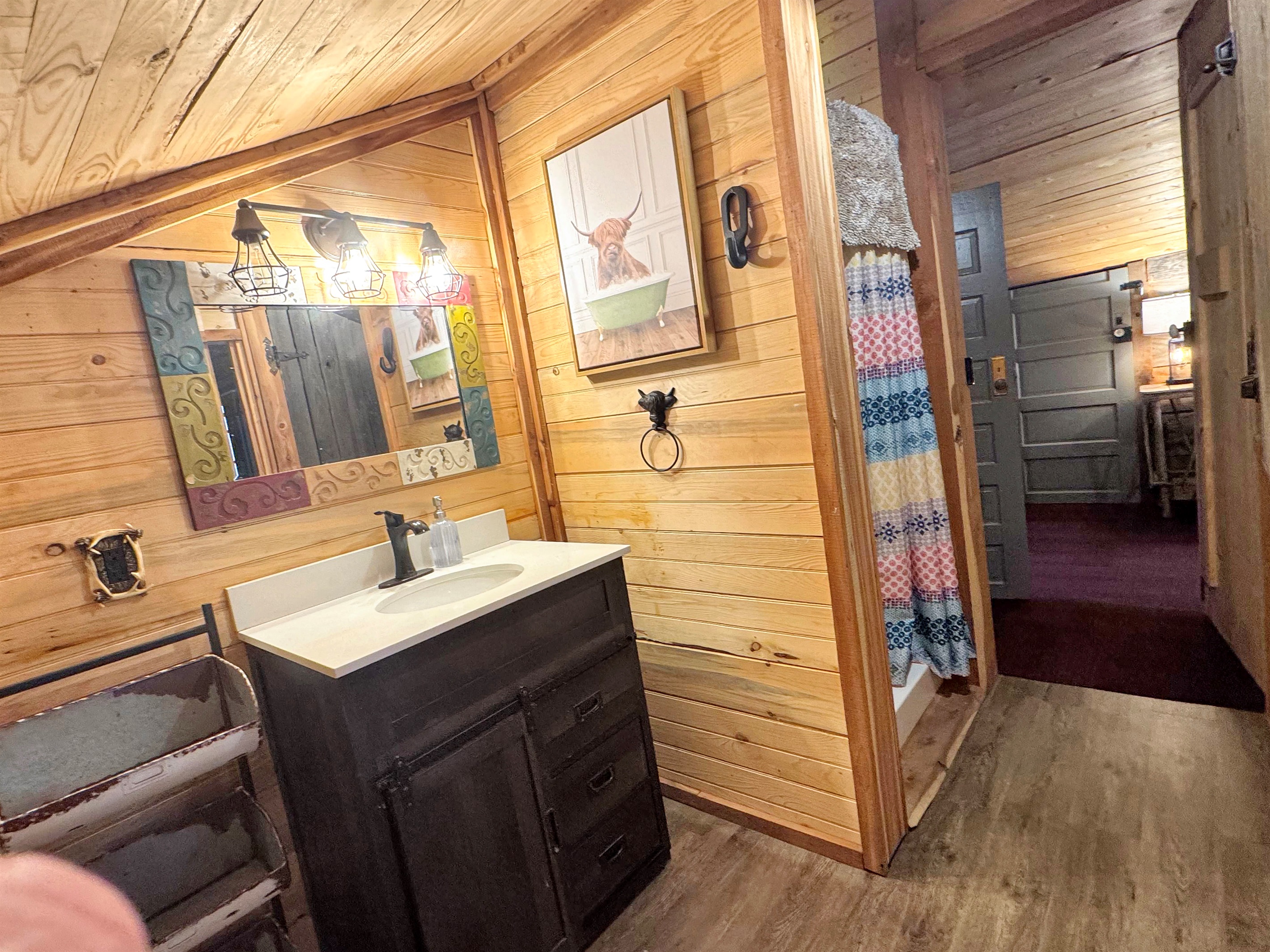 Upstairs bathroom with shower.