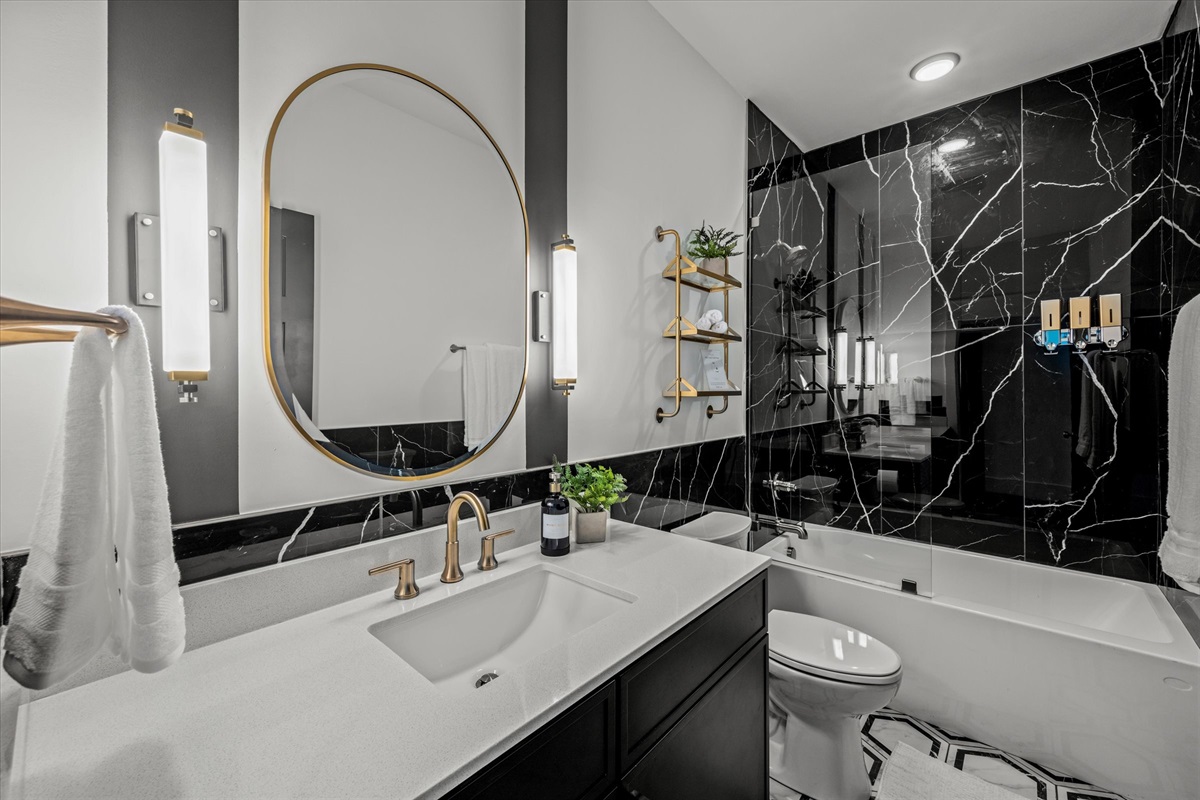 A bedroom and bathroom with its beautiful mountain view!