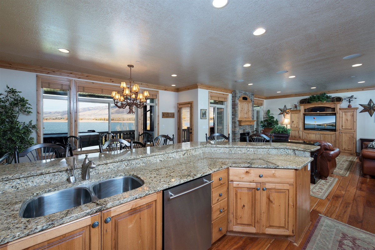 Granite countertops and spacious kitchen island—perfect for cooking and gathering.