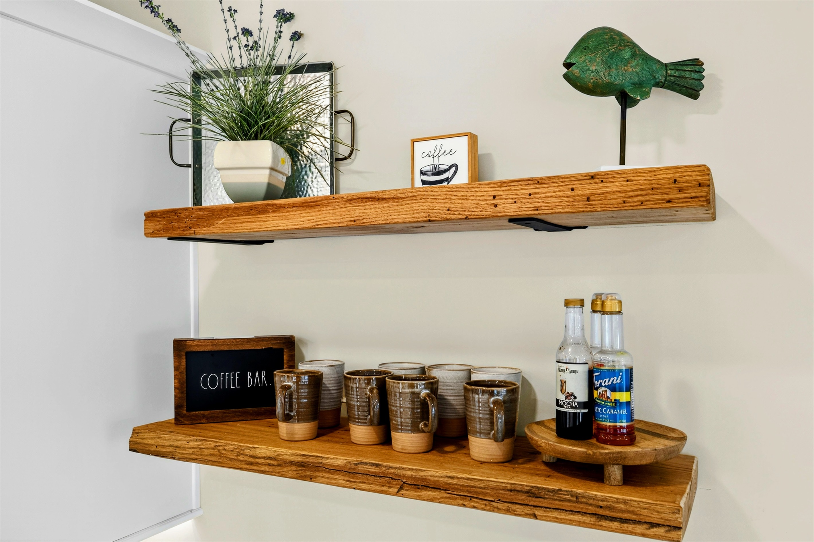 Coffee lovers will love our mini coffee bar in the kitchen. we offer a great selection of specialty coffee syrups as well as a Keurig, pods, coffee, grinder, and regular drip coffee maker.