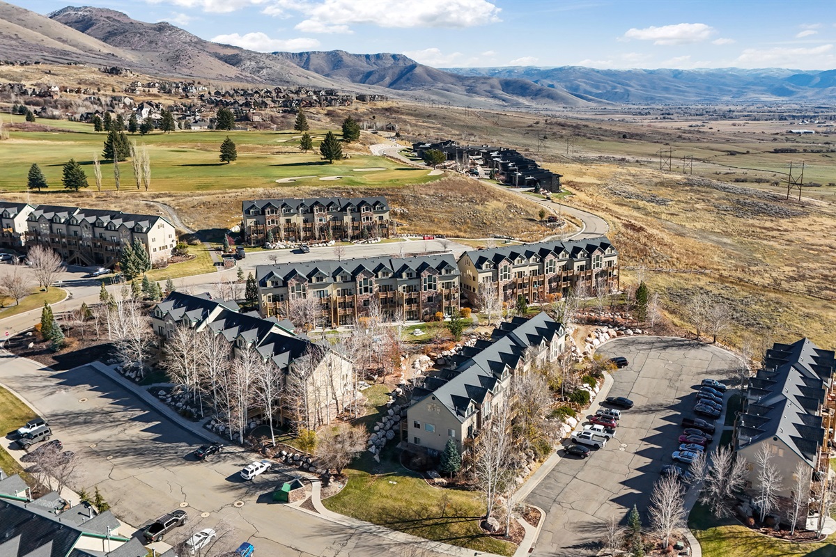 Take in sweeping aerial views of the community surrounded by beautiful mountain landscapes.