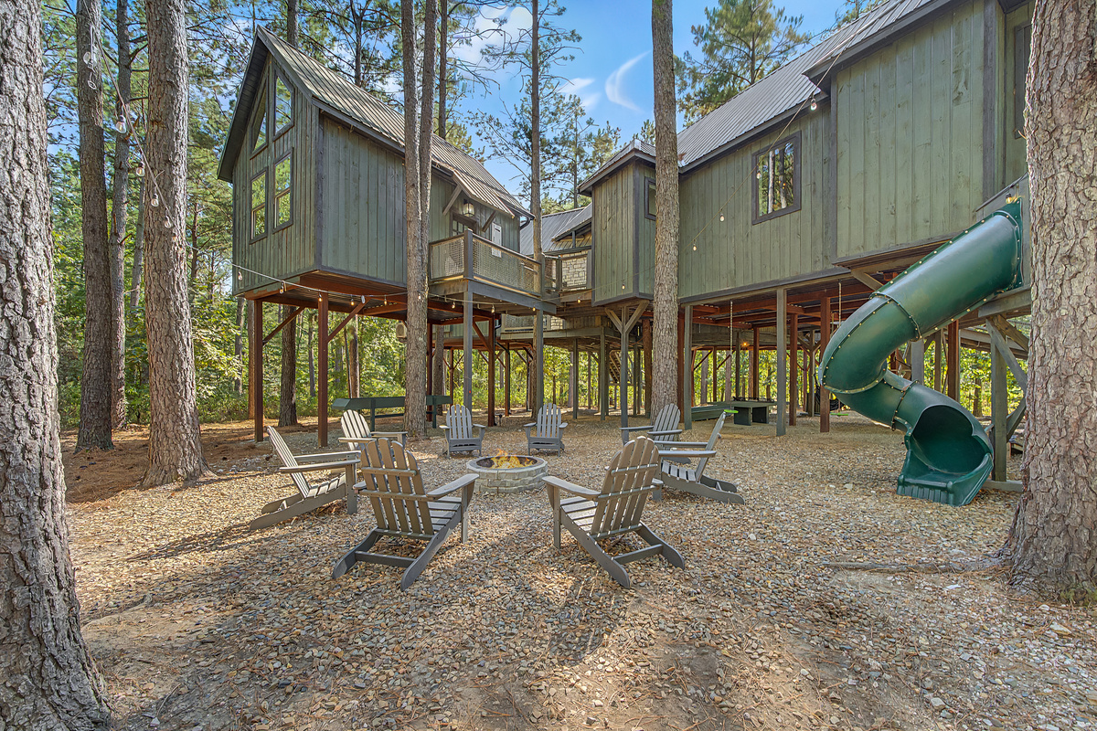 Take the fun outside with the spiral slide, fire pit, and play spaces woven right into the treehouse setting.