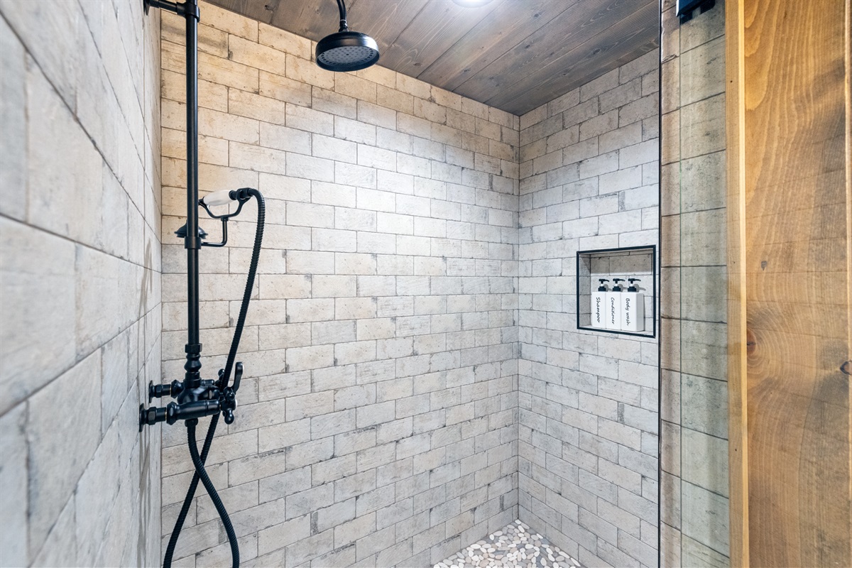 Walk-in shower with modern tilework and spa-inspired ambiance