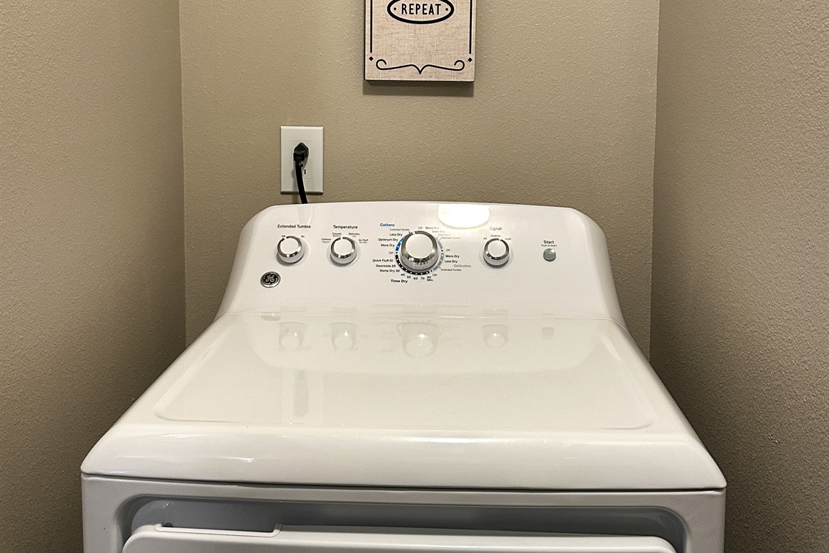 Full size dryer in the laundry room