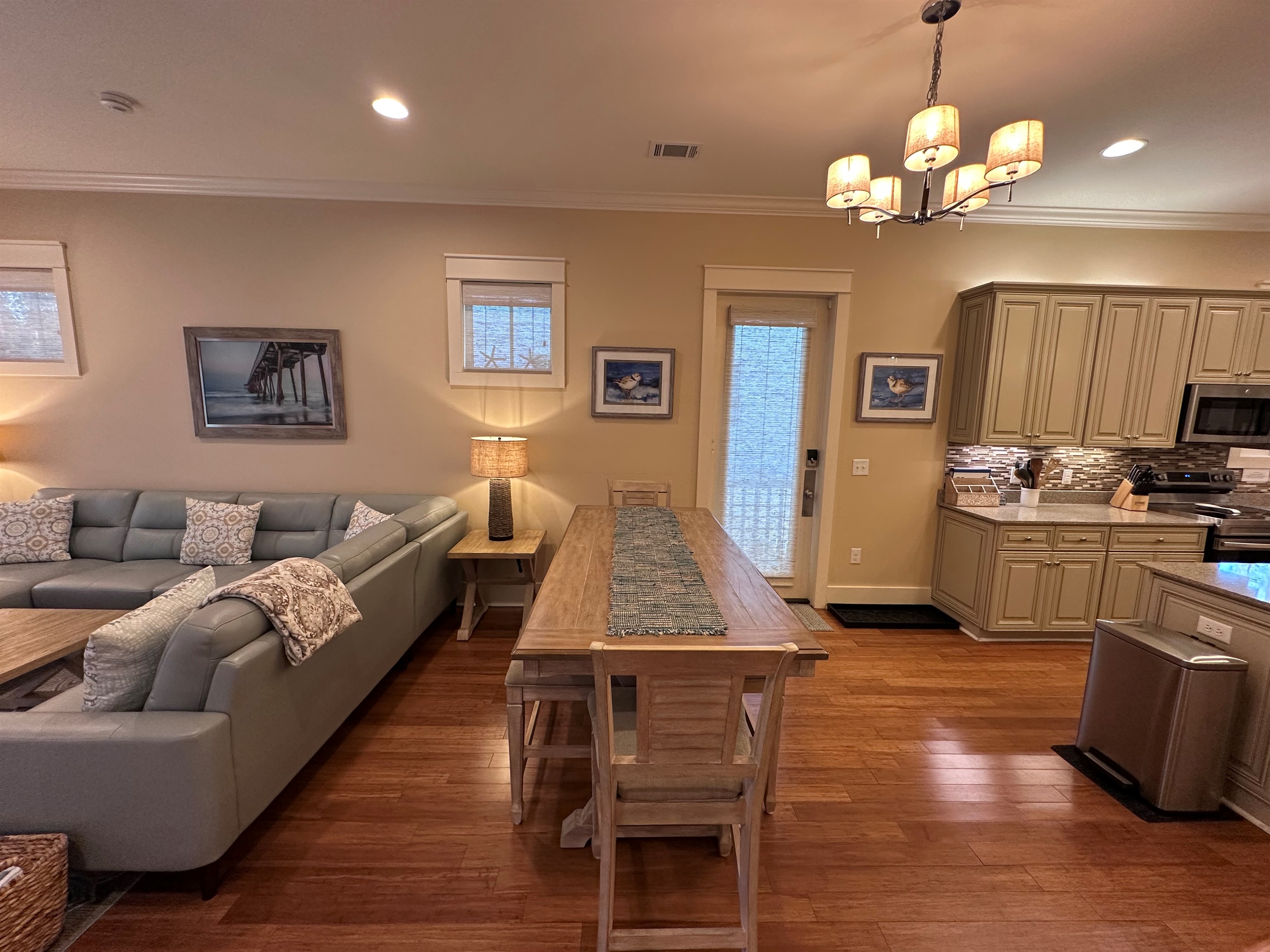 Dining Table seats 6 easily with seating for 2 more at the Kitchen Island.
