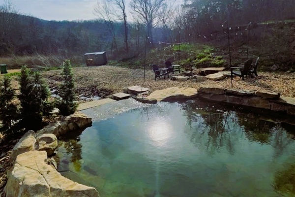 Natural Grotto Pool: Enjoy flowing water features fed by spring-fed private creek