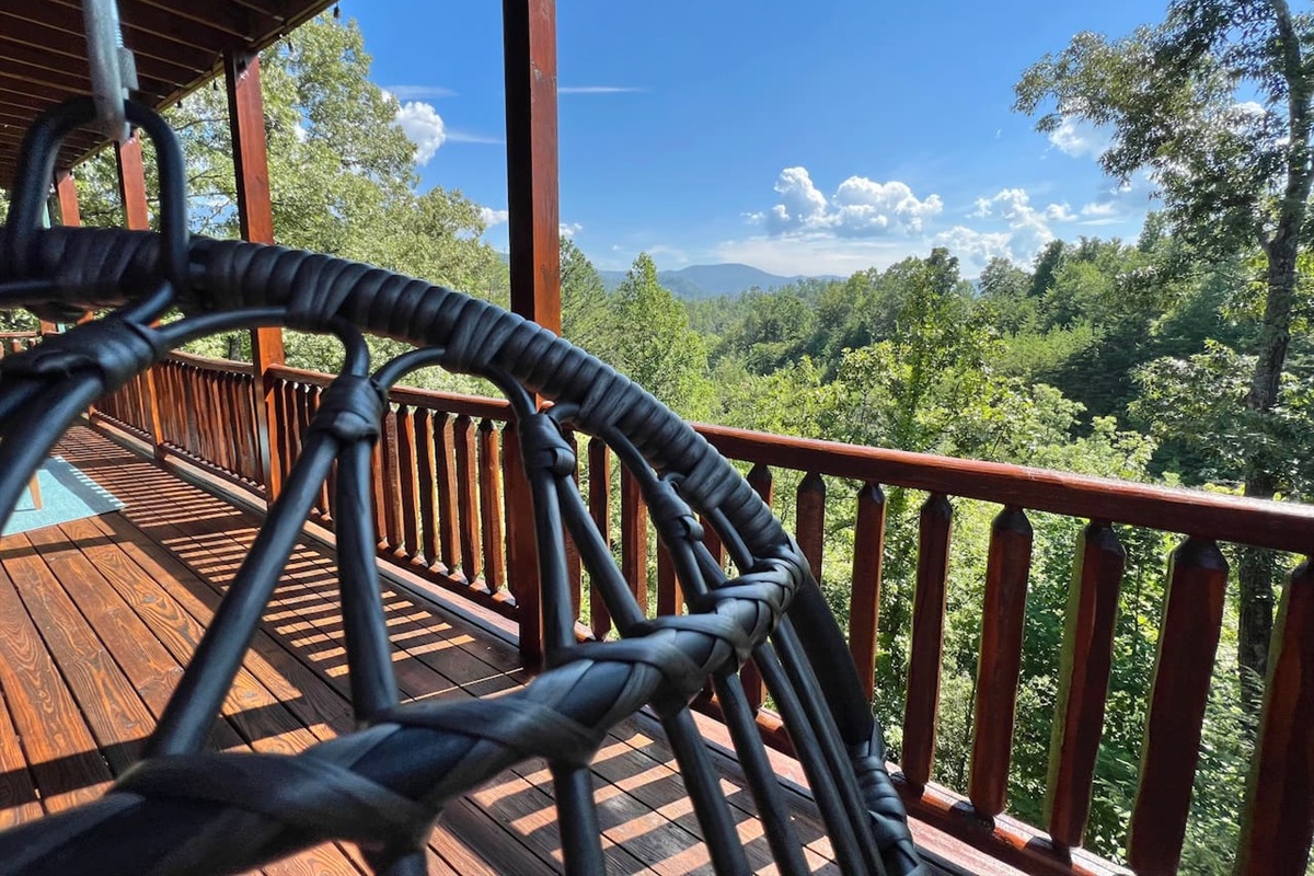 Enjoy a swing in our 2 hanging porch chairs & savor the scenery