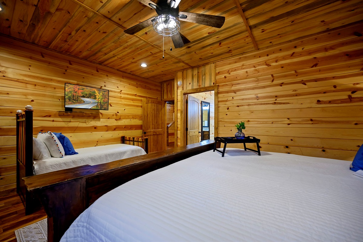 Comfortable sleeping space with plush bedding and cozy cabin vibes 💤
