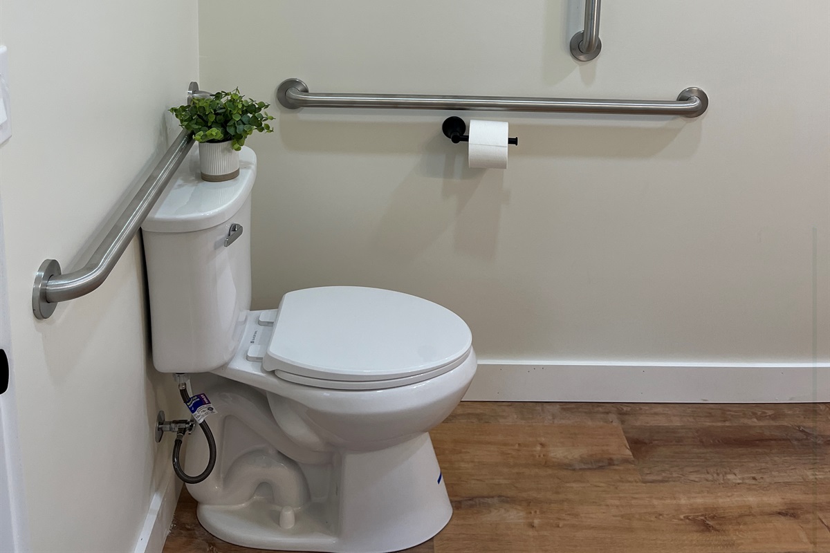 Large bathroom with ADA grab rails