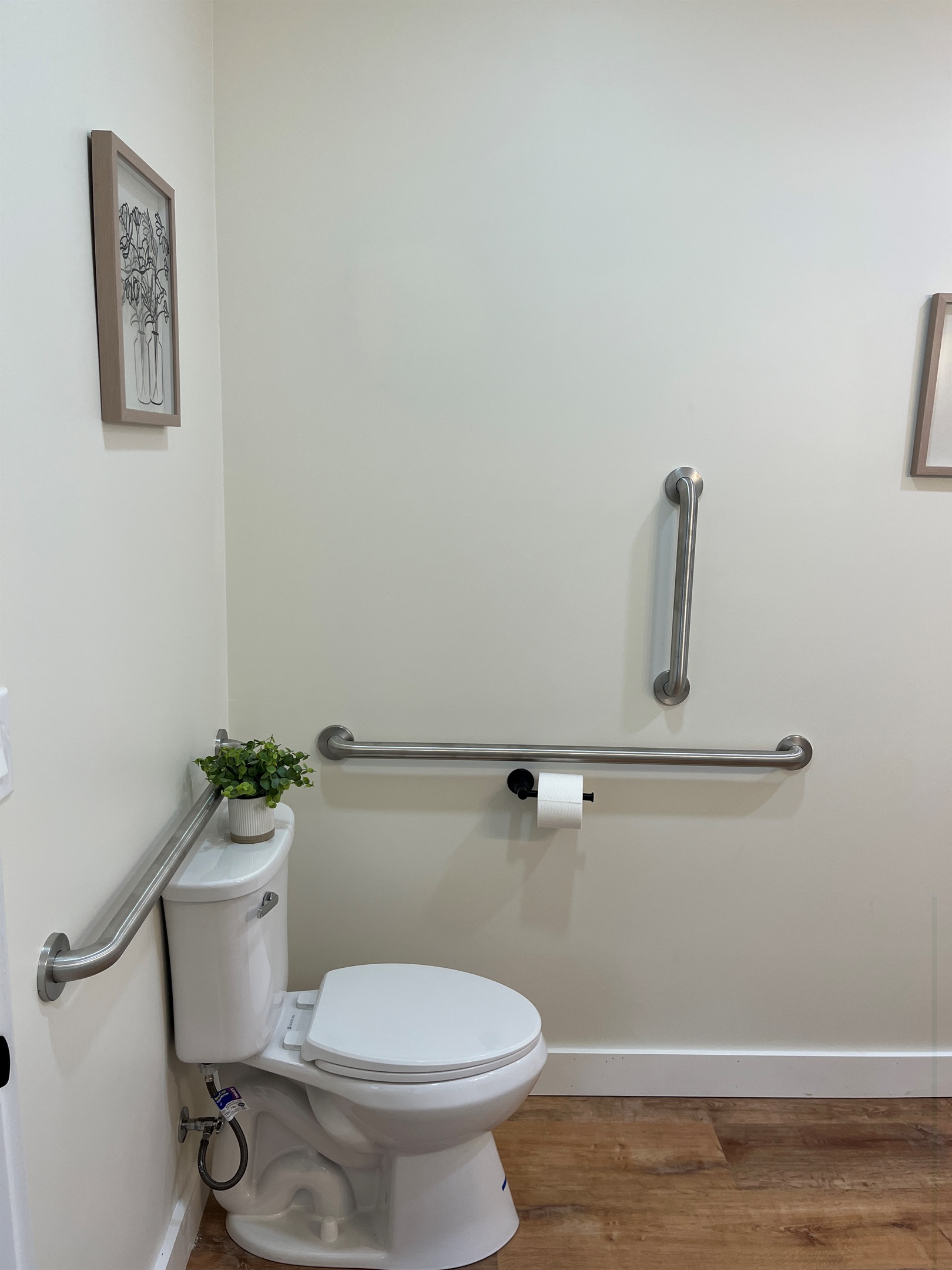 Large bathroom with ADA grab rails