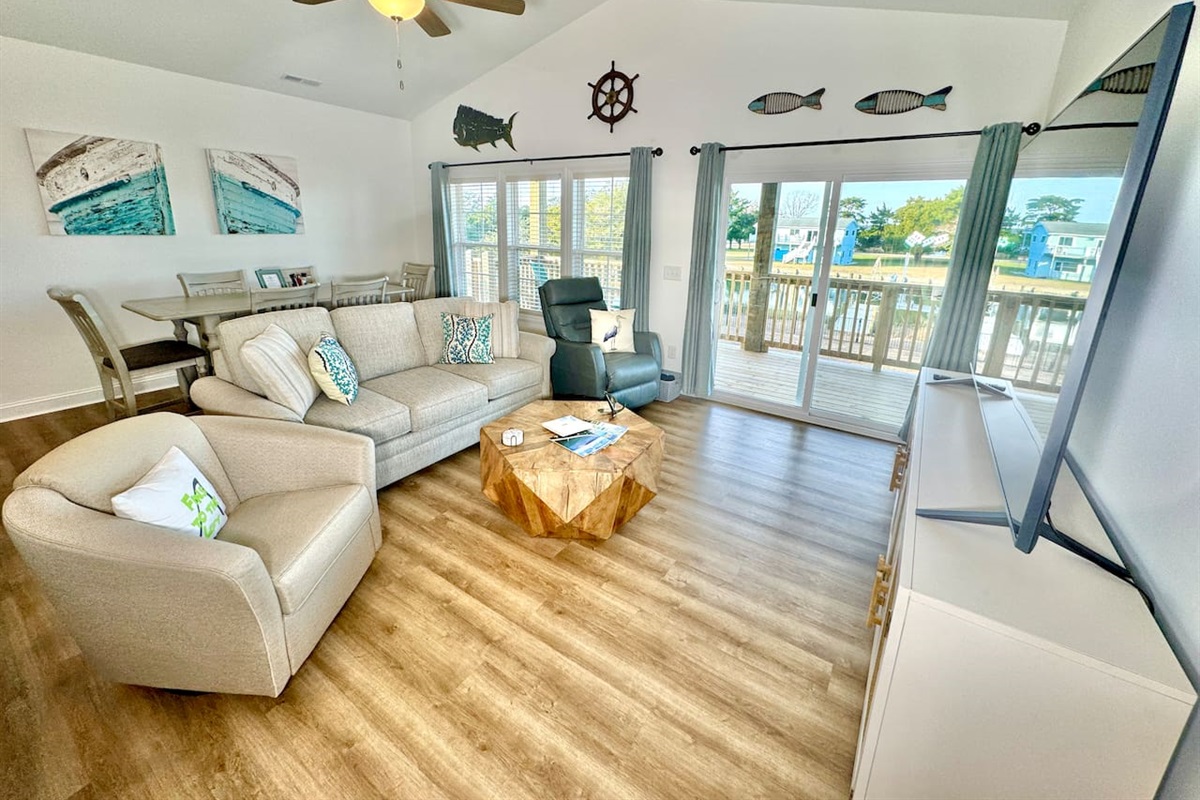 Get cozy while you relax in this living room with a water view. Sofa bed features a Queen mattress.