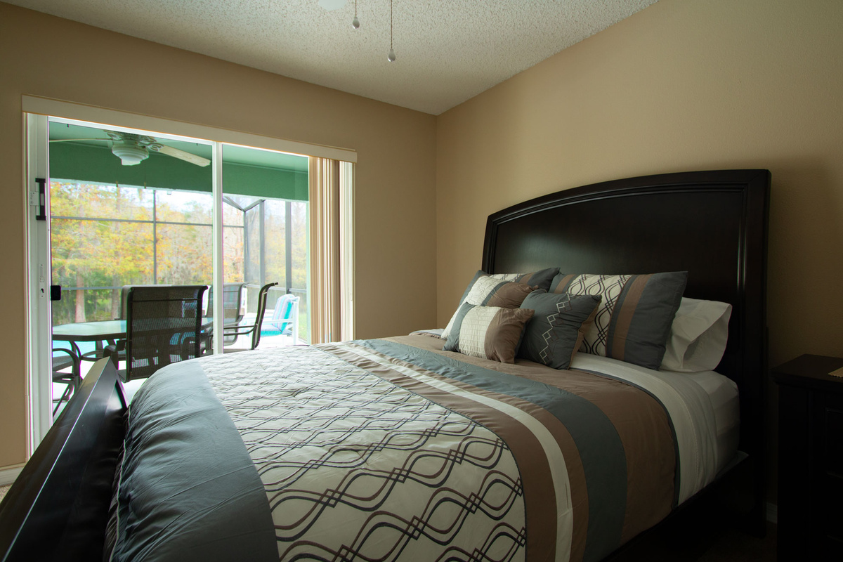 Queen Bed with pool access. TV in every room!