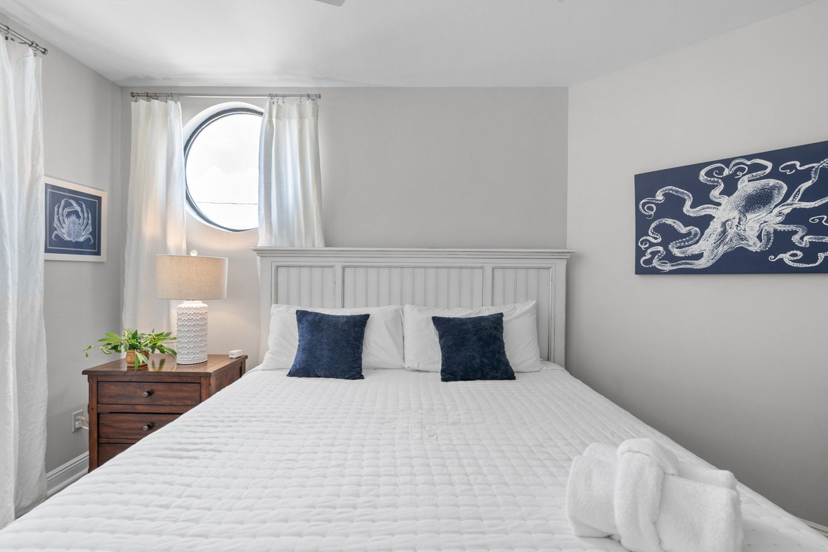 Relax and recharge in this cozy, thoughtfully appointed bedroom.