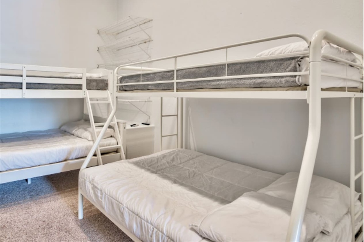 Bunk area with two twin-over-full bunk beds