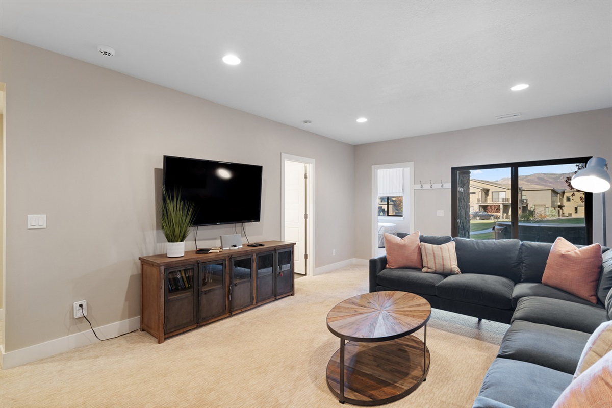 Additional family room with direct access to patio and hot tub.