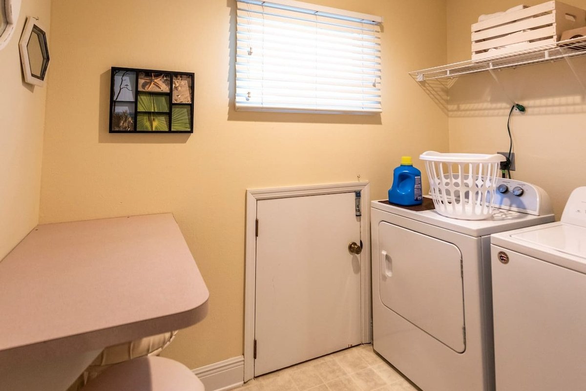 Load the washer with beach towels and sandy swimsuits on the fly &mdash; full-size washer and dryer on the top level, exactly where you need them after a full beach day.