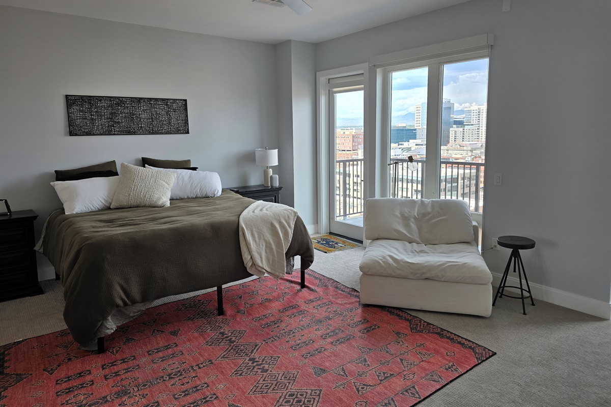 King size bed, extra seating area, private balcony with seating.