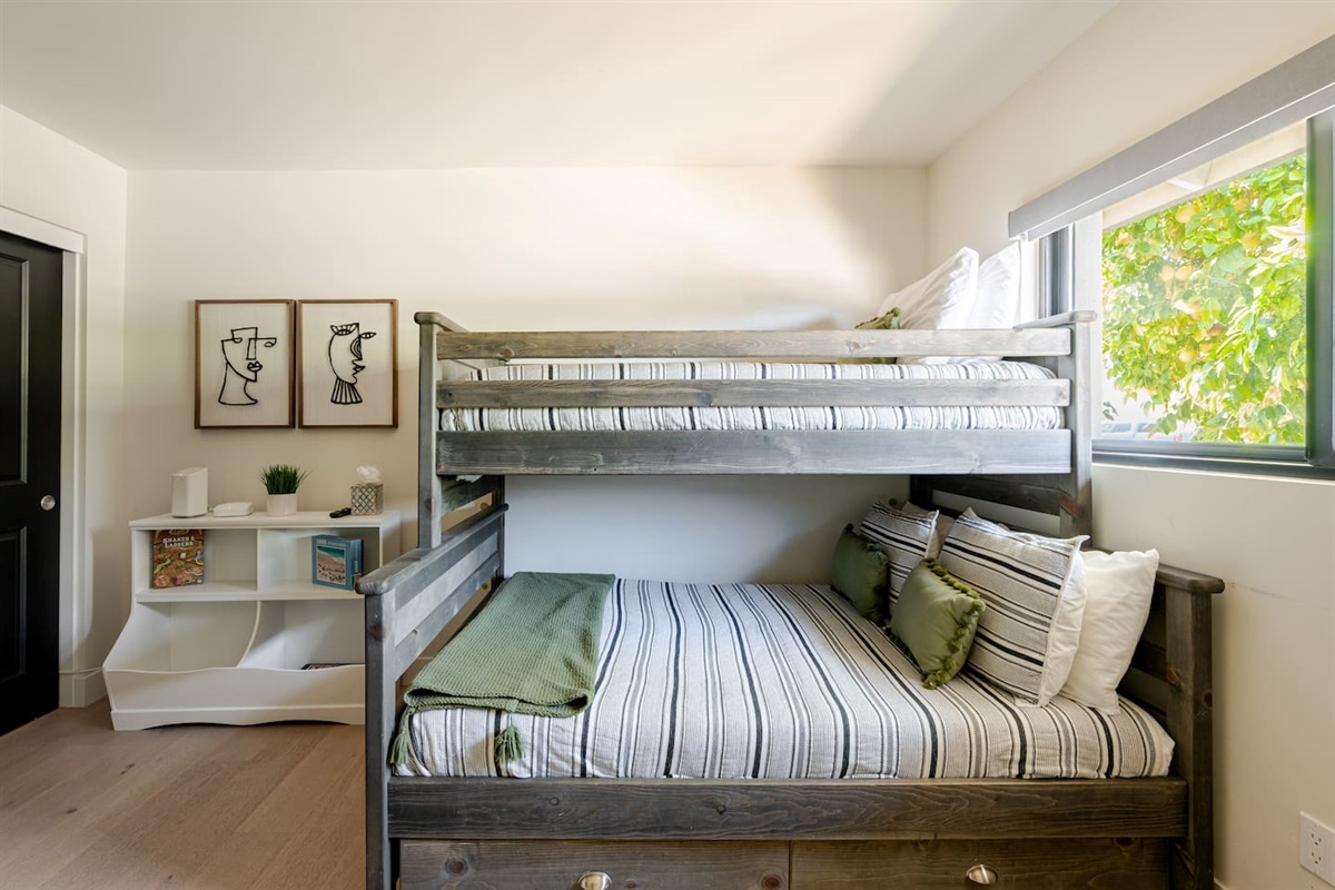 Natural light fills the room, creating a bright and welcoming environment for a restful night.