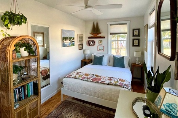 Master bedroom with queen bed. 