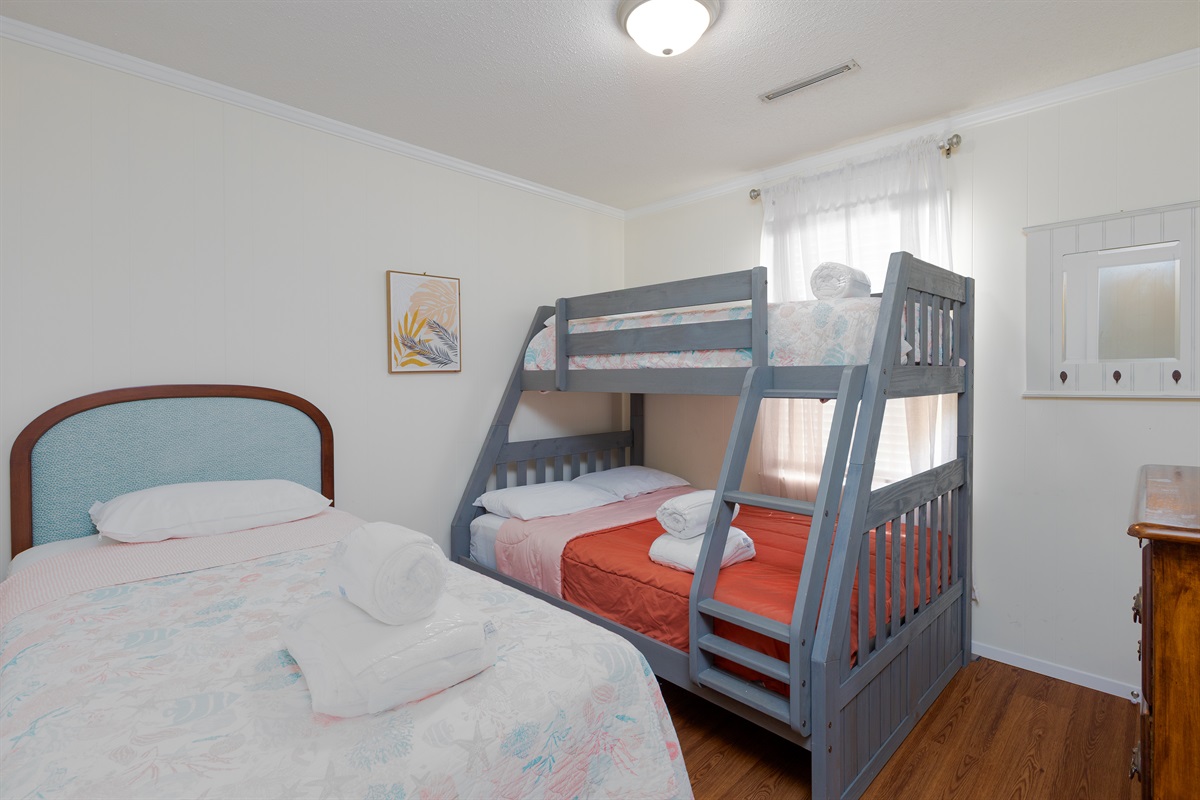 Bedroom 4 offers a Double-size bed and a twin-over-full bunk