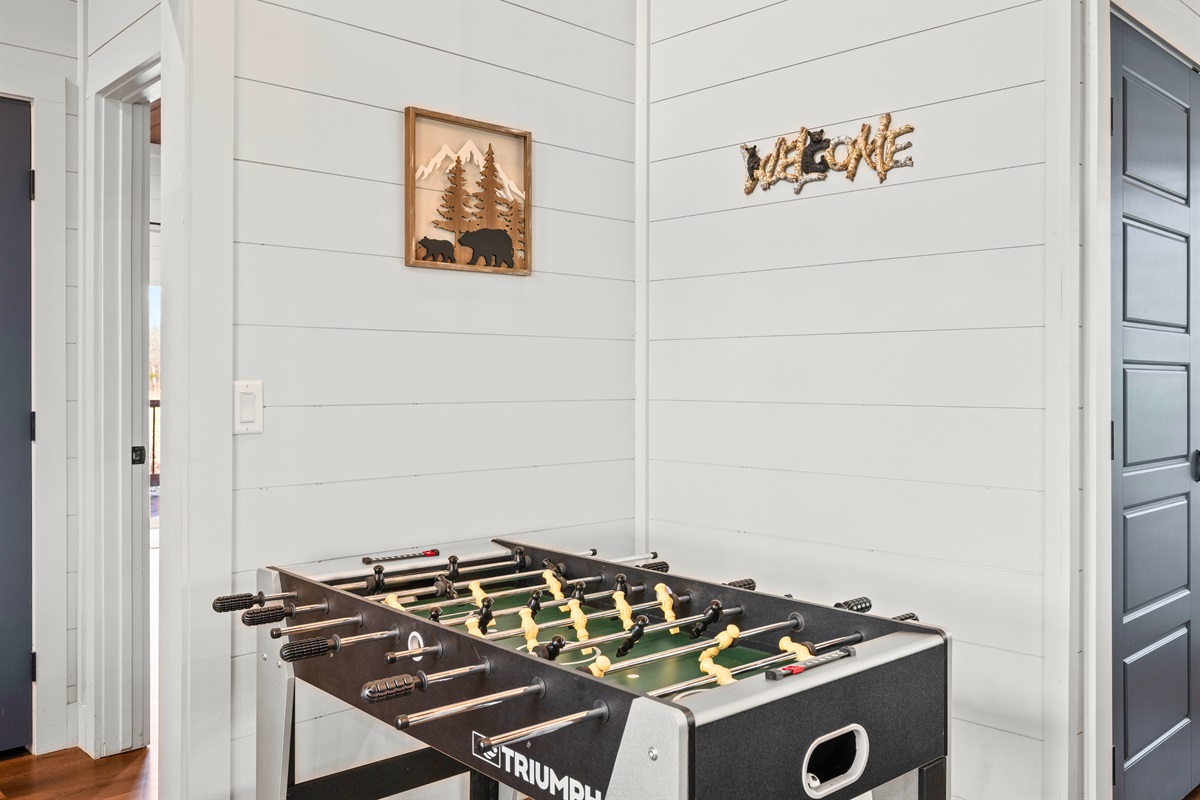 Adding a little friendly competition to your stay is easy with this foosball table, perfect for quick games and playful tournaments.