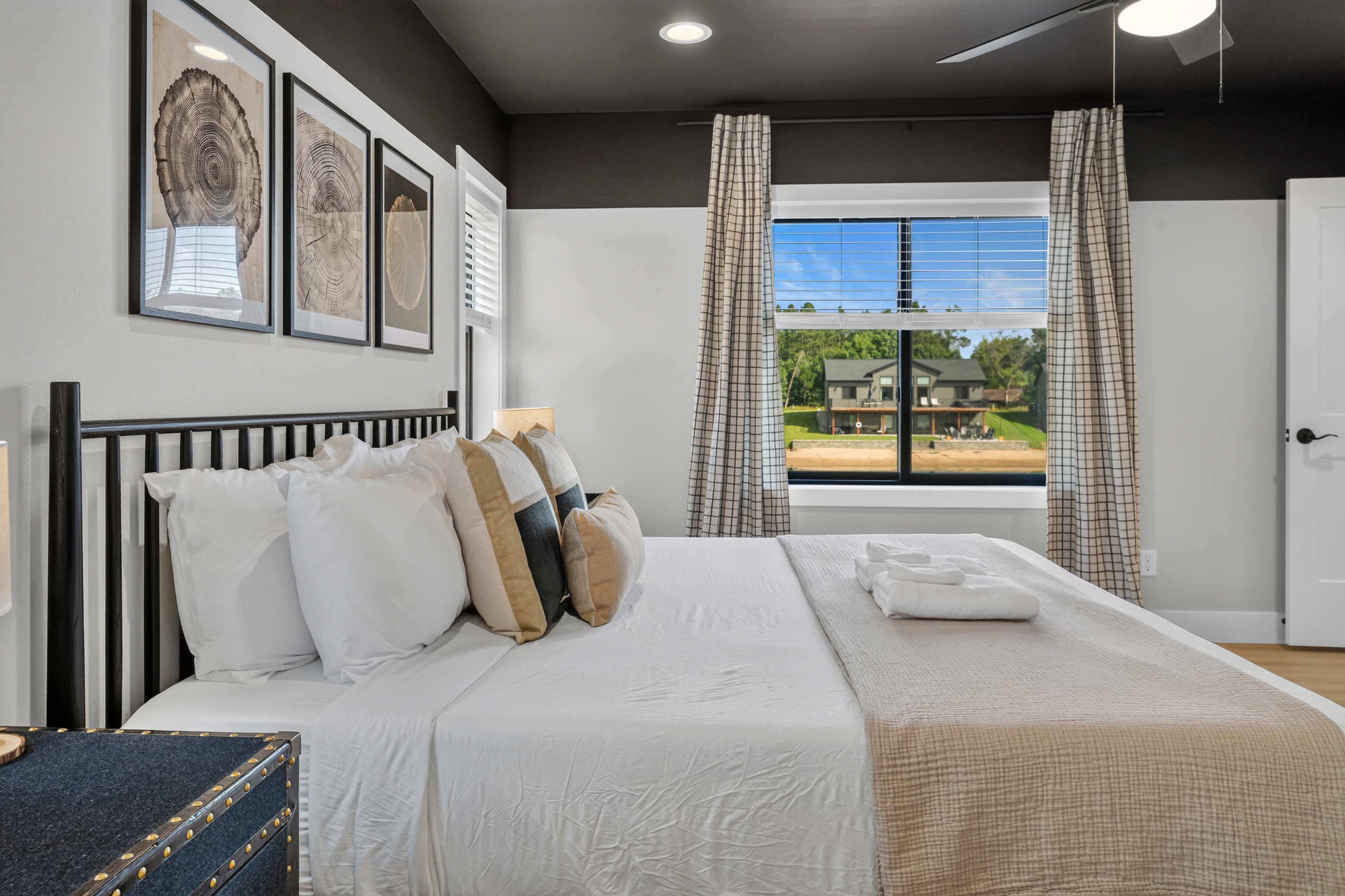 Upstairs King memory foam bedroom with ensuite, smart tv and lake view