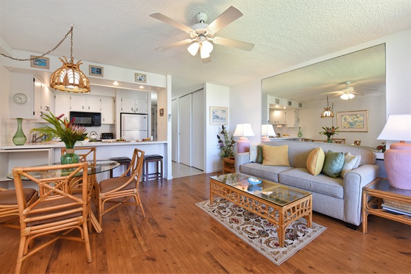 Living room with dining table, breakfast bar and sofa bed