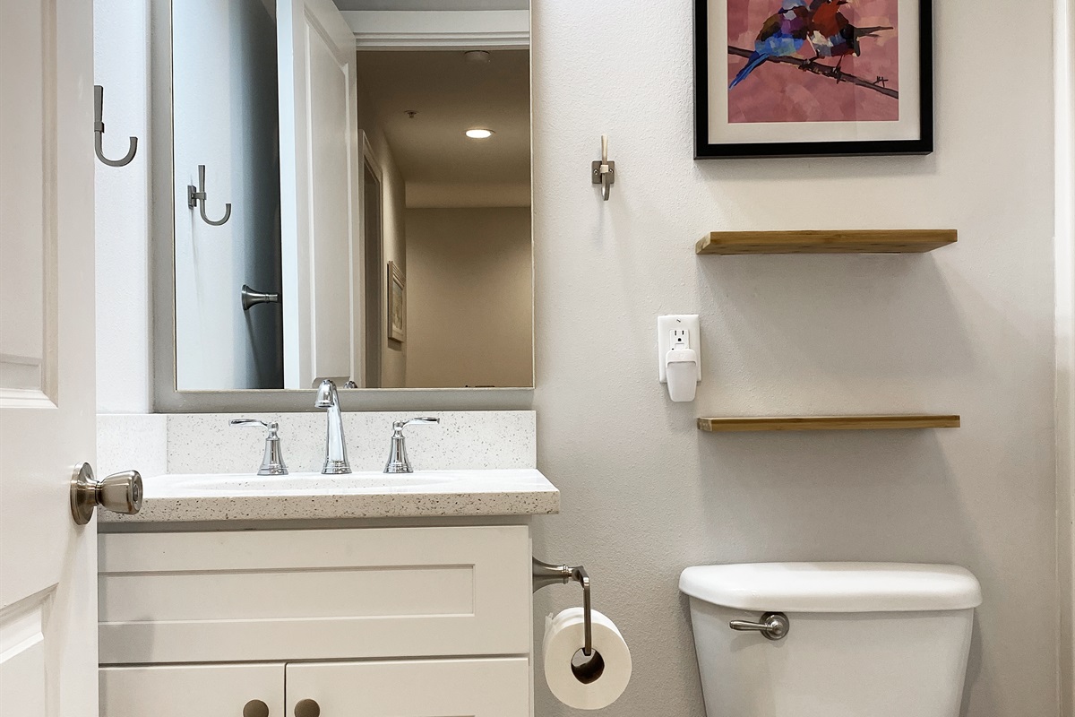 TIDELANDS | Bathroom 2: Just down the hall from bedrooms 2 and 3 and the laundry area.