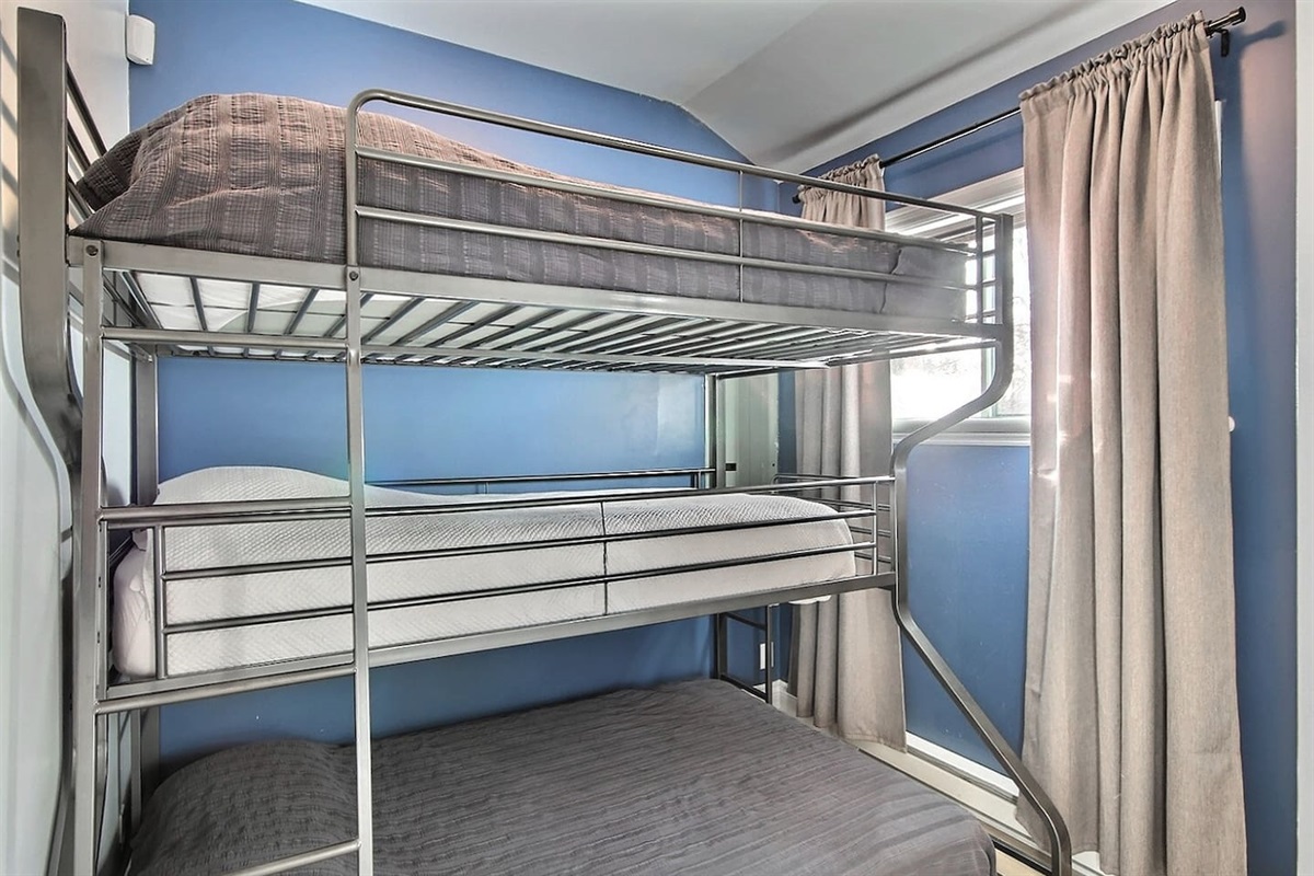  Second bedroom with two twin beds for flexible sleeping