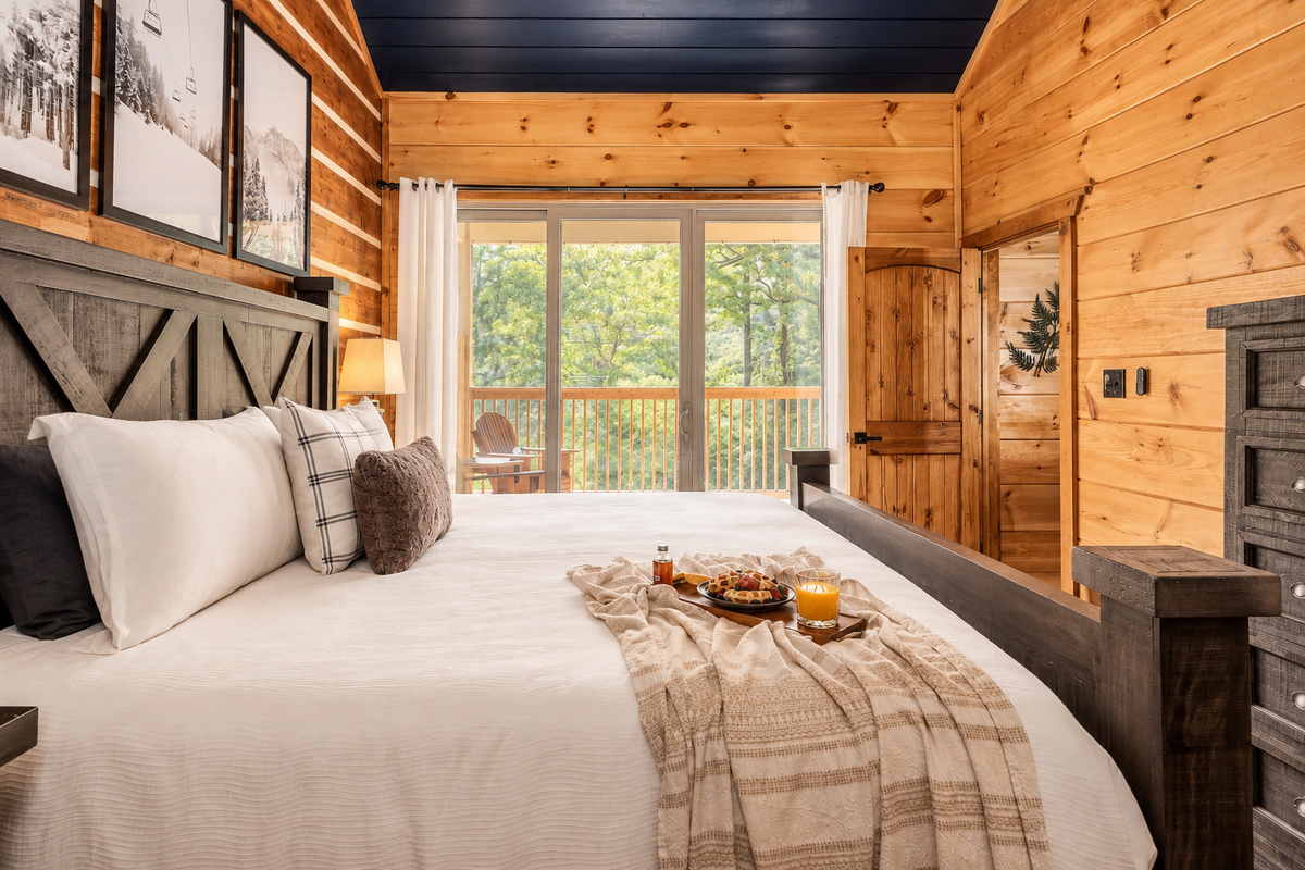 Wake to treetop views, then slide the door open and step onto your own balcony.