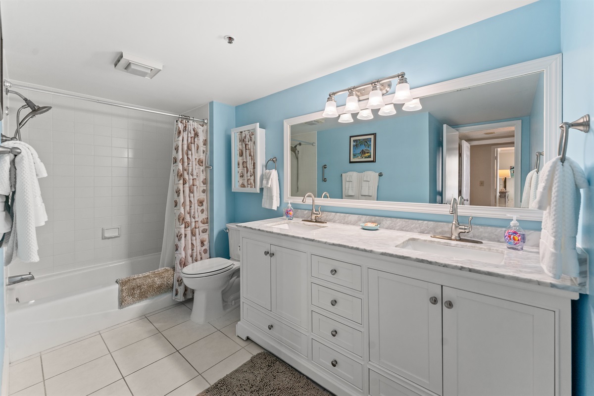 Large Main Bathroom with double sinks and tub/shower combo