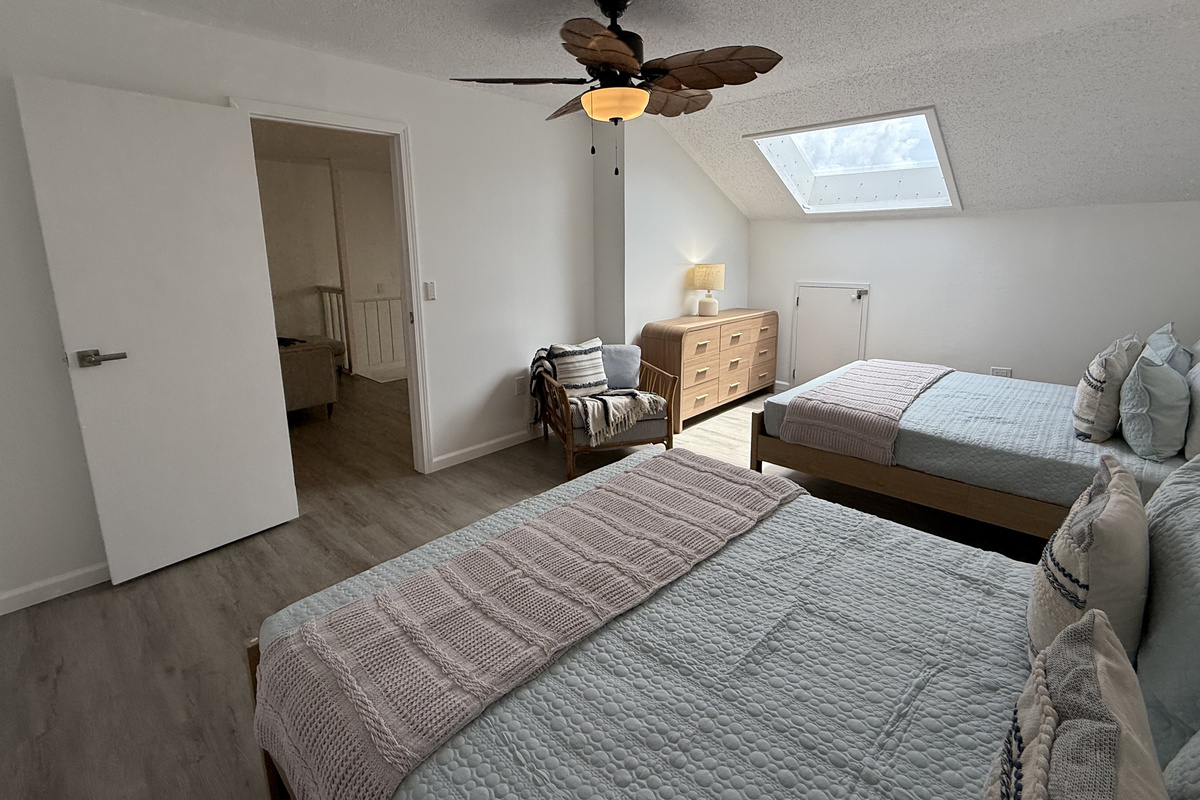 Plenty of space to relax with two comfortable queen beds in the loft bedroom