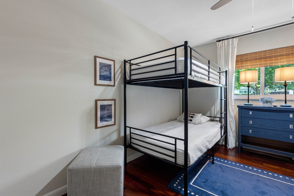 Comfortable and practical space with sleeping arrangements for four, ideal for large families.