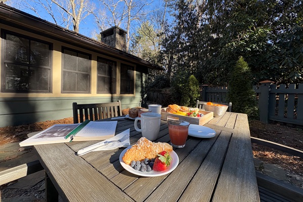 Enclosed Patio: Enjoy a sunny outdoor patio perfect for relaxed breakfasts surrounded by nature.