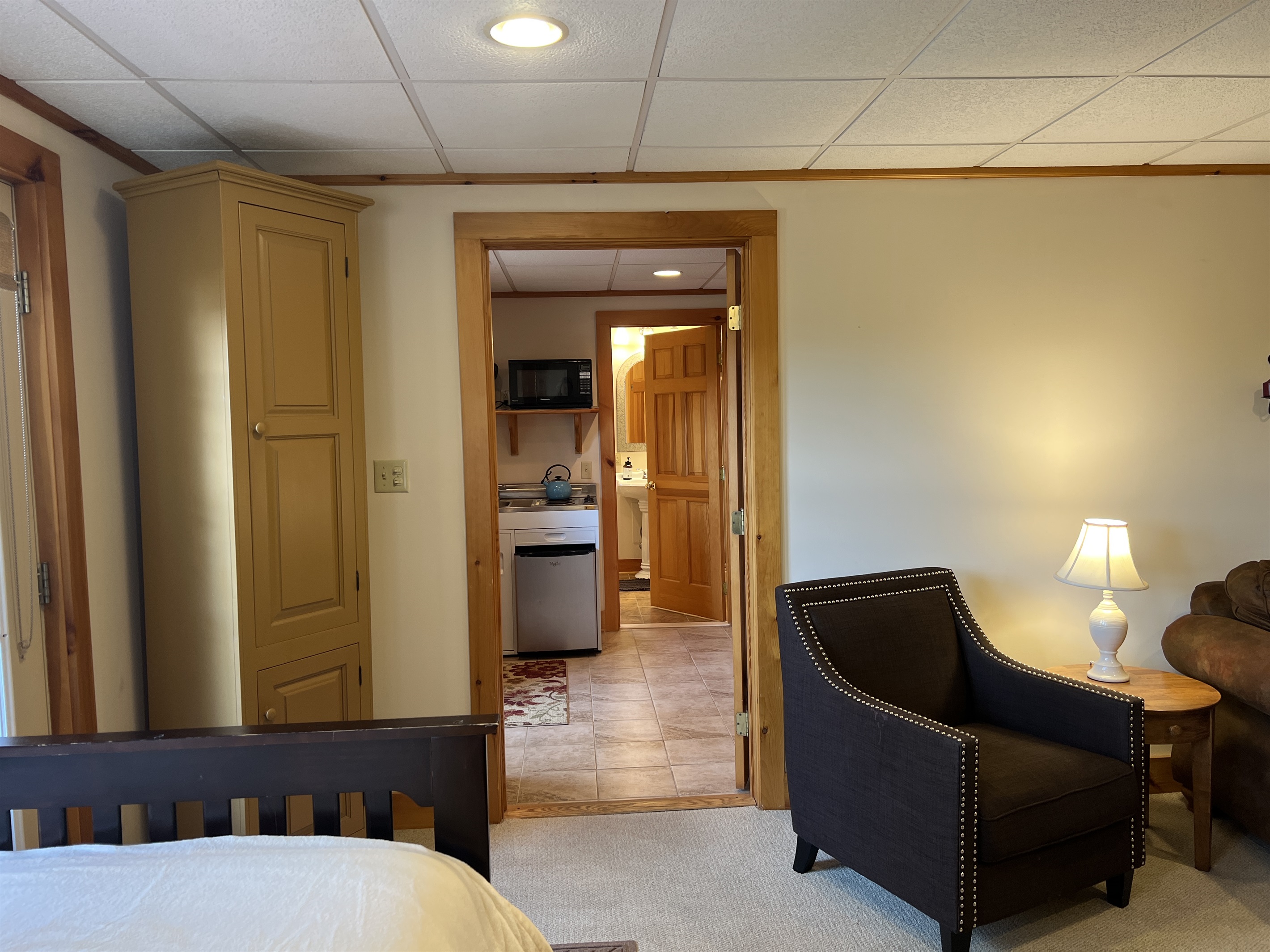 Kitchenette and bathroom beyond
