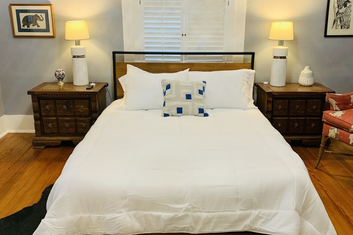 The front bedroom has a queen bed, TV and a connecting bathroom. 