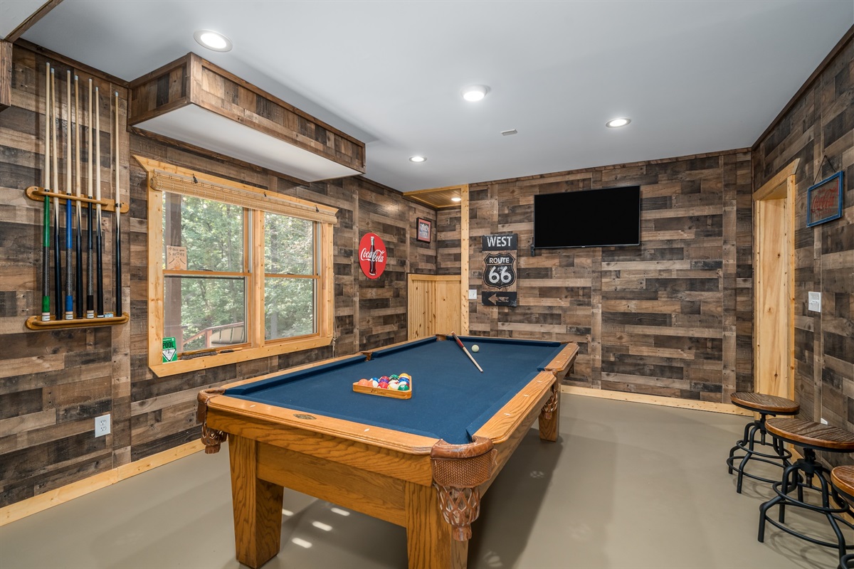 A round of pool to teach others how it is played! Enjoy a sports channel or local news while playing pool or foosball or relax in front of the electric fireplace and watch a movie. 