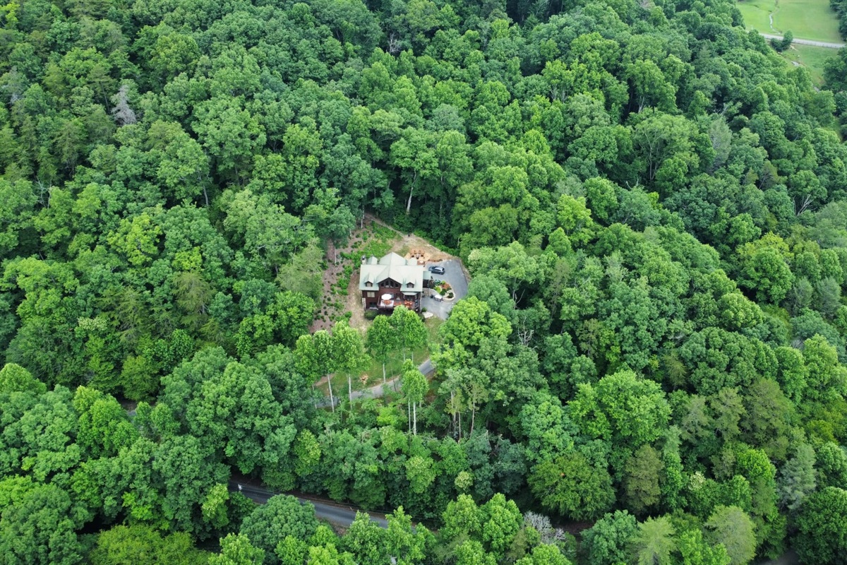 Secluded on 9 acres with private hiking trails.