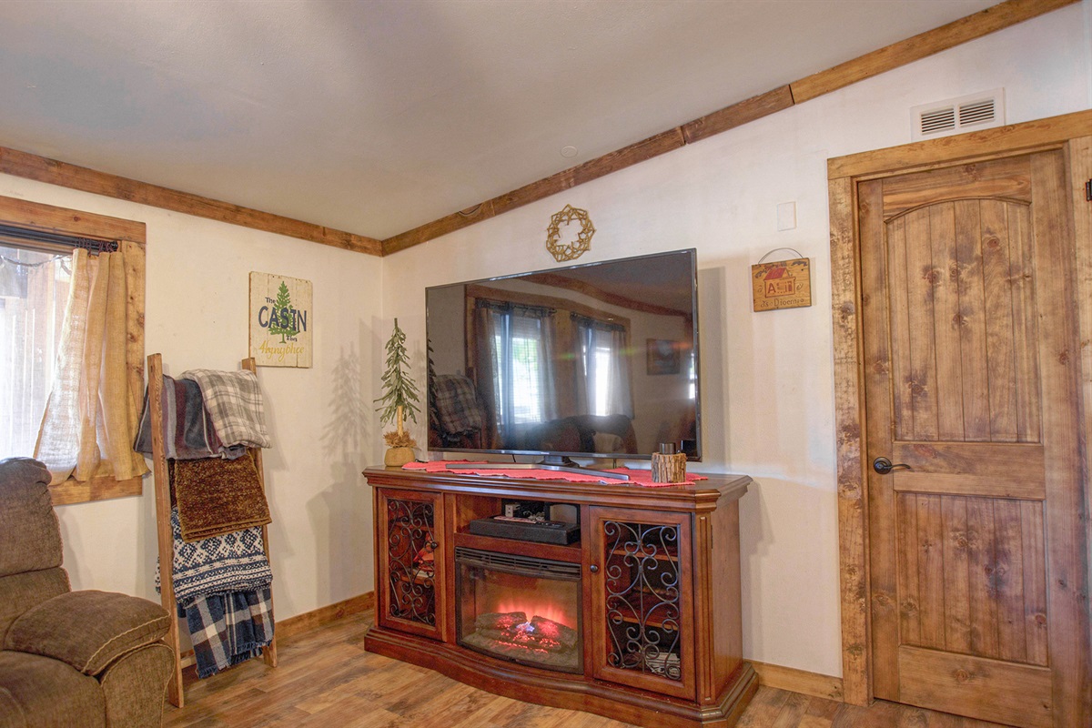 Bright living room with natural light and peaceful forest vibes