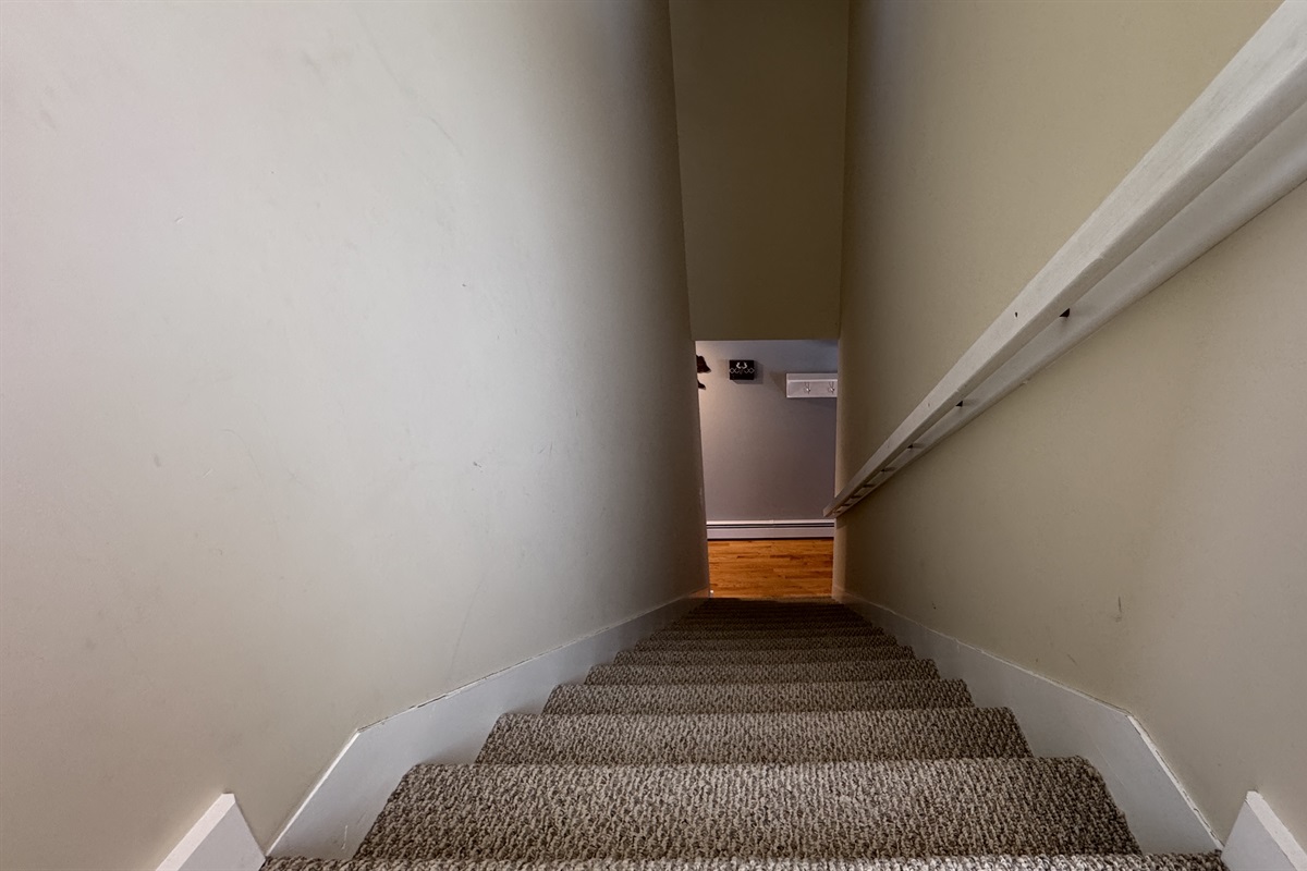 Stairs that lead up 2 the Primary Bedroom and 3rd bedroom