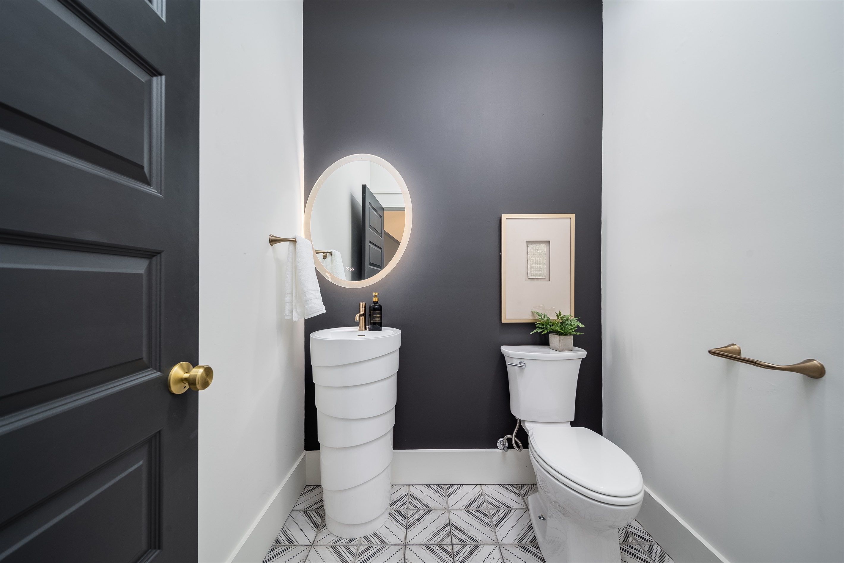 A beautifully designed guest powder room, offering privacy and convenience during your stay.