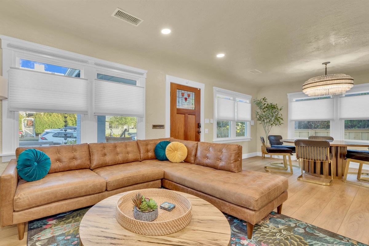 Living Room: Bright and inviting space with chic decor, perfect for relaxation or lively gatherings!