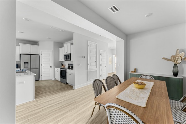 Enjoy the formal dining room connecting to the kitchen
