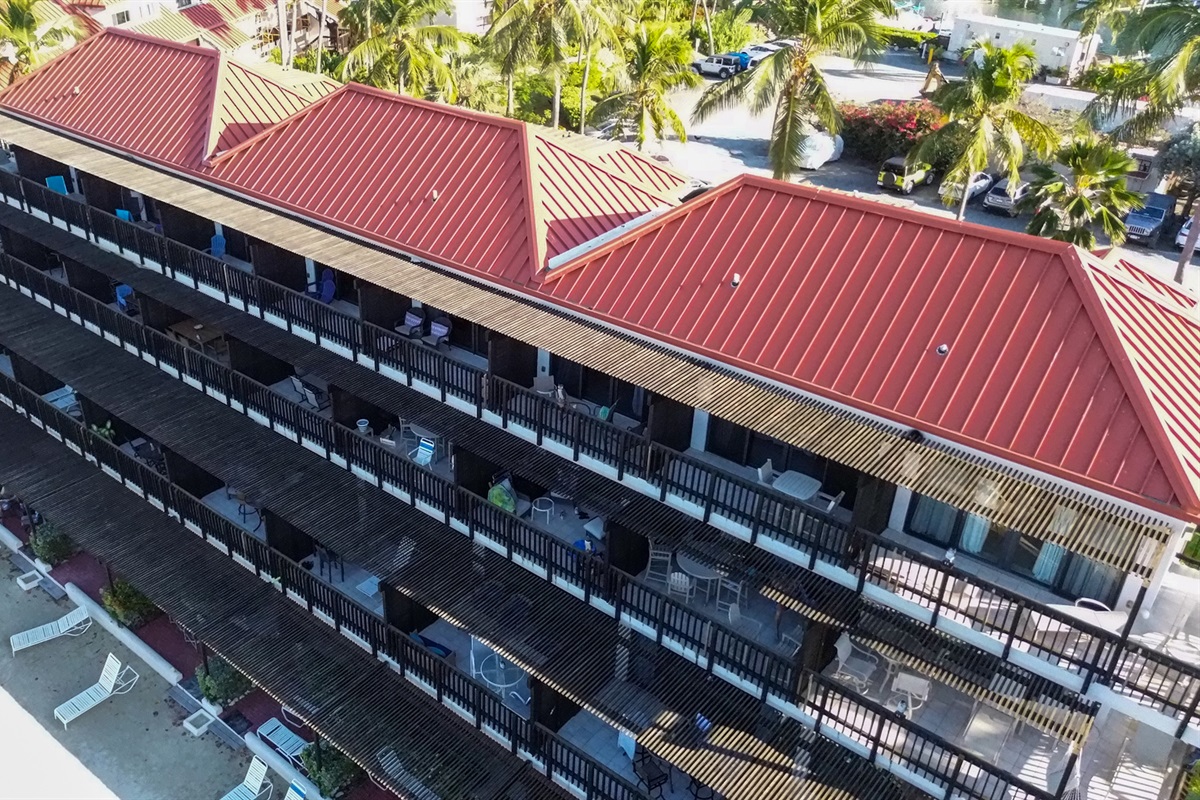 Surrounded by lush tropical landscaping and just moments from the sand and sea.