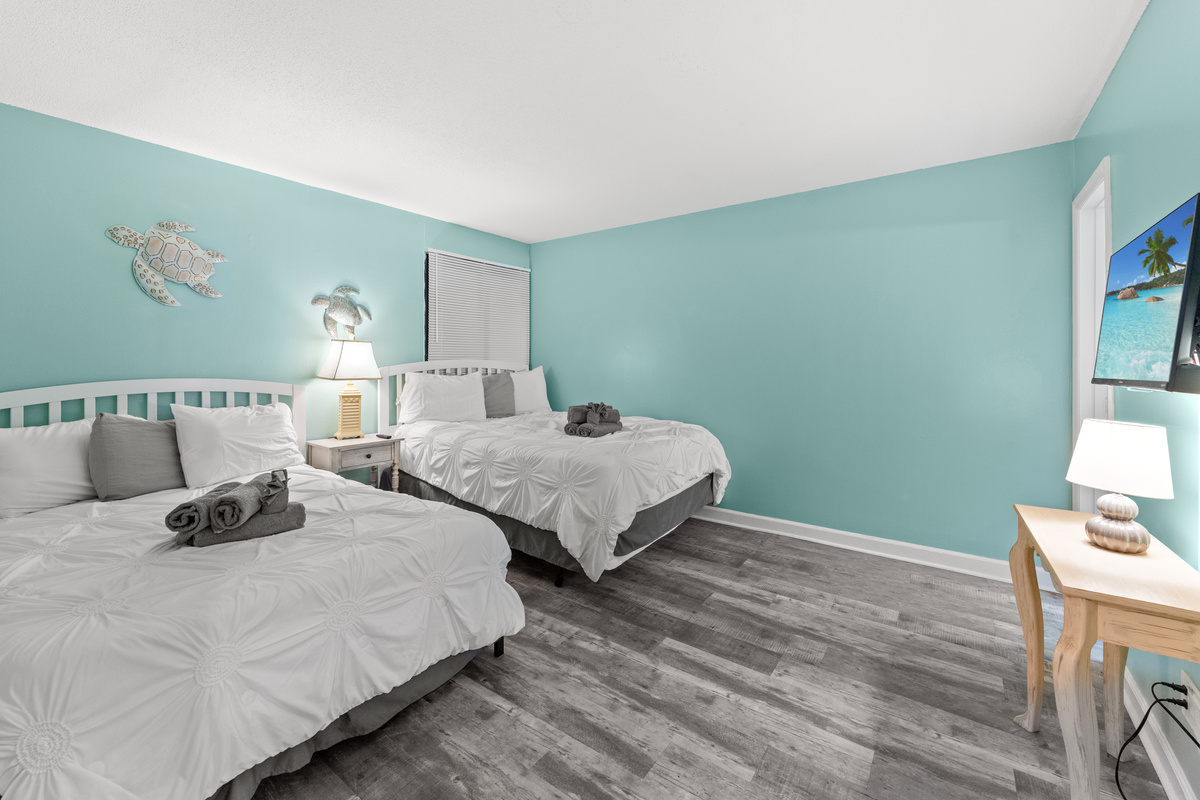 2nd Bedroom with a queen and double bed