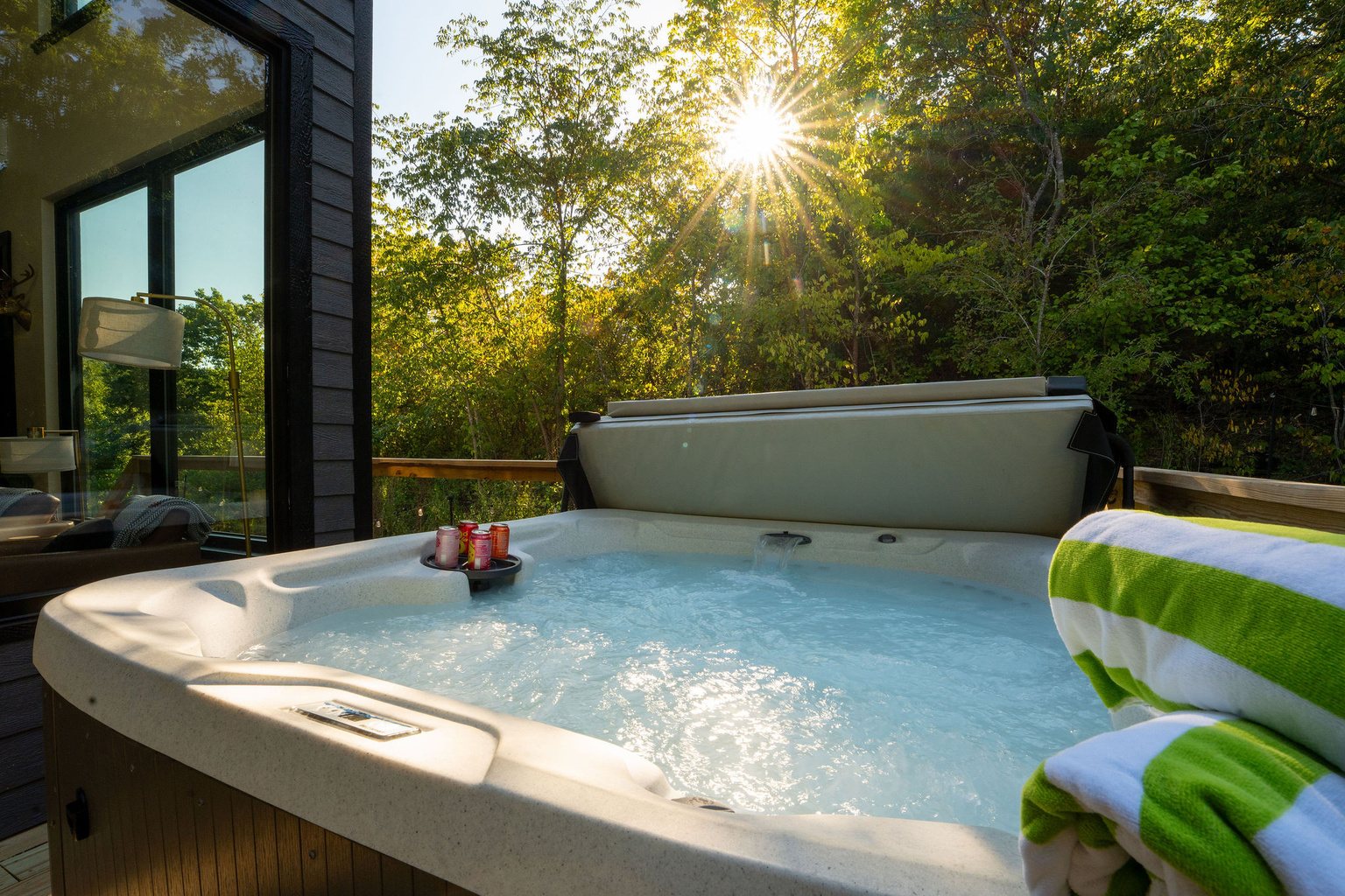 Soak beneath the trees in your private hot tub.