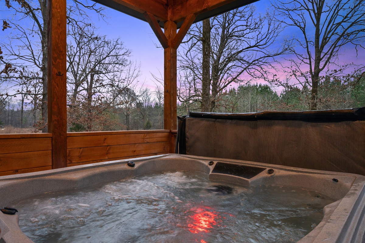 A soak in the hot tub is always a good idea here, especially with the quiet wooded view all around you.