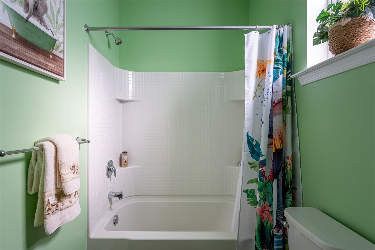 Full size soaking tub with convenient bath supplies