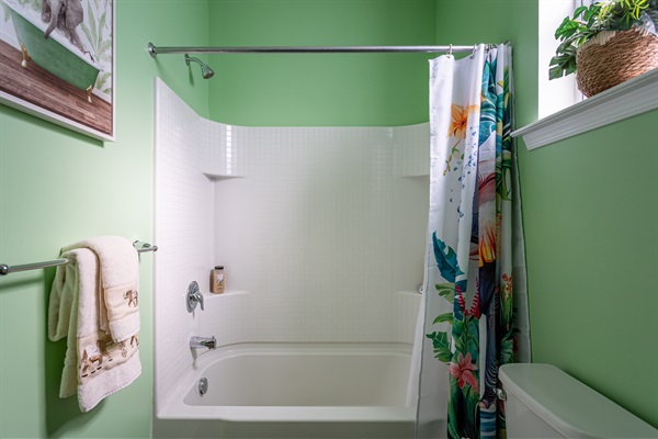 Full size soaking tub with convenient bath supplies